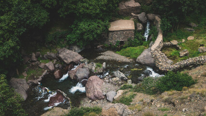 River from the Atlas mountains in the Imlil region. Picture with grain giving an old vibe.