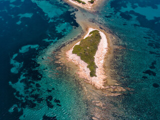Aerial top down view of small island in aegean sea in Greece