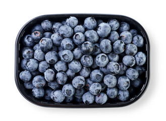 Blueberries in a container close-up on a white background. top view