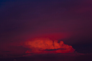 Dramatic colorful monsoon cloud formation in the sky during sunset