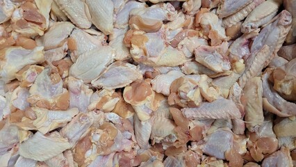 Raw chicken wings background. Photo image