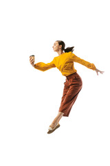 Studio shot of graceful young girl in action, motion isolated on white background. Contemp dance, start-up, open-space, professional occupation concept.