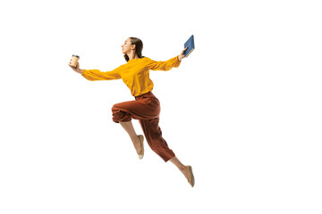 Studio shot of graceful young girl in action, motion isolated on white background. Contemp dance, start-up, open-space, professional occupation concept.