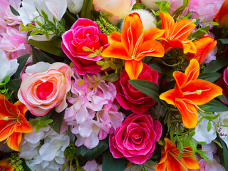 Beautiful multicolored  artificial flowers background