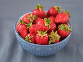 Fresh organic strawberries in a bowl
