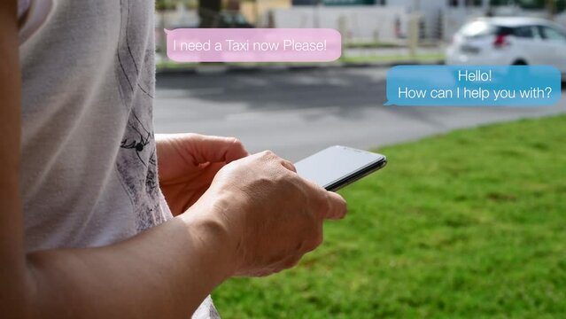 Woman in the street ordering a taxi with the help of the chatbot of her smartphone with cars passing in the background
