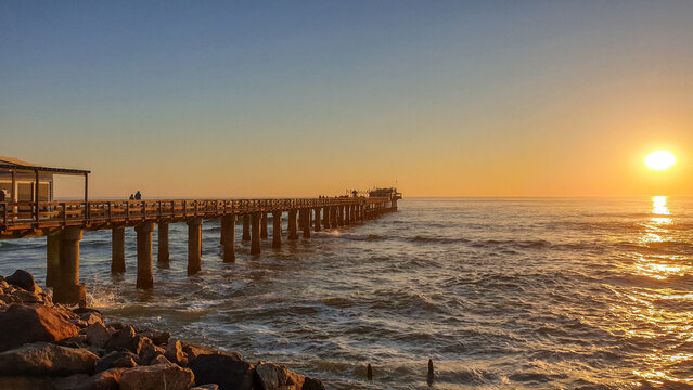 sunset on the jetty of swakopmund Namibia