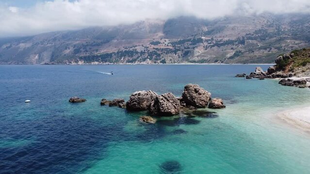 Vouti beach - Kefalonia - Greece - Aerial travelling in to rocks