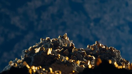 Gold pieces in the rocks. A gold mine. Noble metal. Golden nuggets. Gold ore.