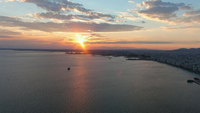 Thessaloniki city shoreline with beautiful sunset, aerial
Drone view from Greece Second large city Thessaloniki at sunset, 2022
