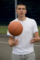 A Nineteen Year Old Teenage Boy Playing Basketball