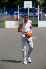 A Nineteen Year Old Teenage Boy Playing Basketball