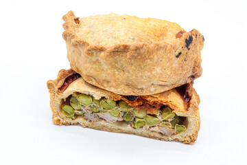typical Majorcan “ empanada ” with meat, pea and sobrassada
