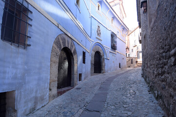 blue house in the historic center of the town of Albarracin, Teruel province, Spain