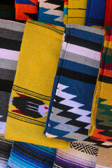 Fototapeta na wymiar Close-up of Mexican Colorful, patterned blankets