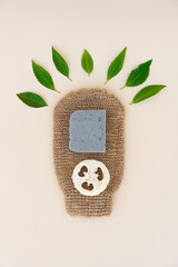 Natural bath accessories for skin care and peeling - hemp or ramie bath gloves, loofah sponge and...