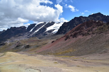 The Rainbow Mountain Vinicunca (Montana de siete colores) and the valleys and landscapes around it in Peru