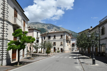 Fototapeta na wymiar A street among the old stone houses of Campo di Giove, a medieval village in the Abruzzo region of Italy.