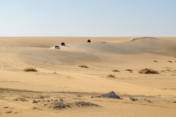 Fototapeta na wymiar footprints in the sand dunes