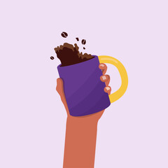 hand holding a cup of coffee