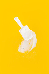 White laundry detergents powder with cup for laundry