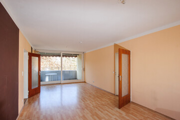 Cozy studio apartment design with bedroom and living space. Hotel room panoramic window, double bed, sofa and coffee table. Urban apartment concept