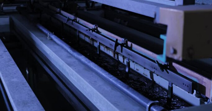 Testing of electronic circuit boards using liquid immersion, in a modern laboratory. Manufacturing of microcircuits and microprocessors. Production of microelectronic equipment. blue toning