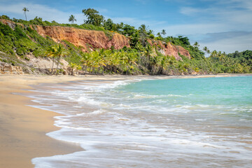 Idyllic Espelho Beach with sea cliffs in Trancoso, BAHIA