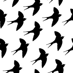  Seamless pattern of a swallow bird on a white background.Vector pattern can be used in textiles, wallpaper, postcards.