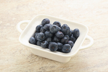 Sweet ripe blueberry heap in the bowl
