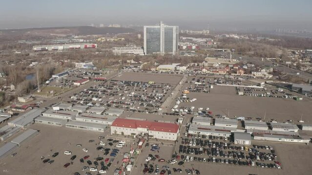 Ukraine, Kyiv - 14 of May 2021. Used cars big parking market. Drone video footage.