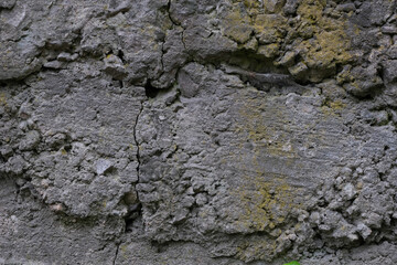 Cement concrete wall background. Gray stone texture and untreated wall surface before finishing