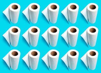 Pattern of white paper towels on blue background.