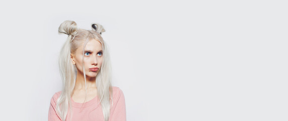 Portrait of pretty blonde girl, funny face. Panoramic banner, copy space.