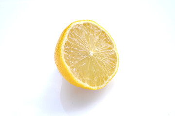 Close-Up Of Lemon Against White Background