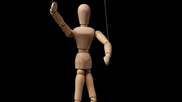 Puppet, wood dummy moving under control, power, manipulation of master boss.