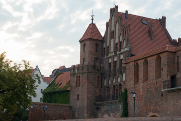 Facade of a beautiful brick building in Torun, Poland