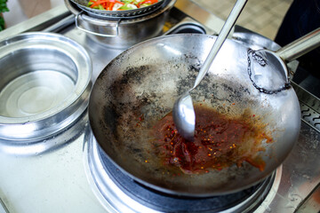 frying pan close up cooking wok noodles