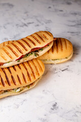 panini with filling. three panini top view