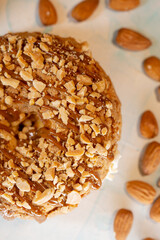 delicious donut with nuts and stuffing top view