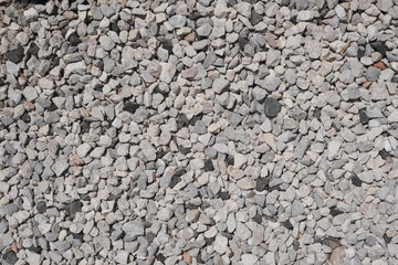 A decorative floor texture made of fragmented small natural stones