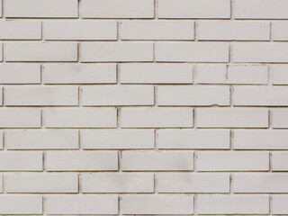Close-up shot of a grey brick wall.