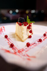 fresh delicious cheesecake close-up on a plate in a cafe