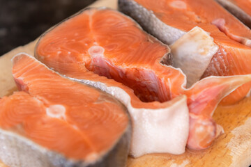 Red salmon fish. Salmon steaks. Healthy eating red salmon fish. Photo on fish production.