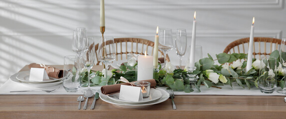 Festive table setting with beautiful tableware and decor indoors. Banner design