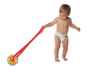 Cute baby with push toy learning to walk on white background