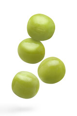 Flying delicious green peas, isolated on white background