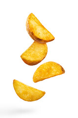 Flying delicious fried potato wedges, isolated on white background