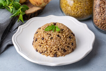 Traditional delicious Turkish foods; bulgur pilaf with green lentils (Turkish name; yesil mercimekli bulgur pilavi)
