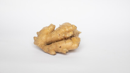 ORGANIC GINGER ON WHITE BACKGROUND WITH COPY SPACE